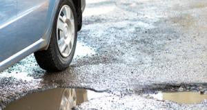 Please Report Potholes, Drive with Care